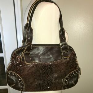 Sharif Studio 90s Snake embossed leather expanding bag